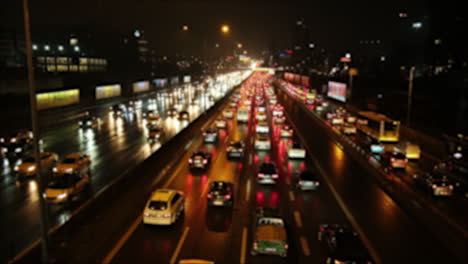 Blurred-heavy-traffic-on-the-D100-highway-in-Istanbul-Anatolian-Side-on-a-rainy-night