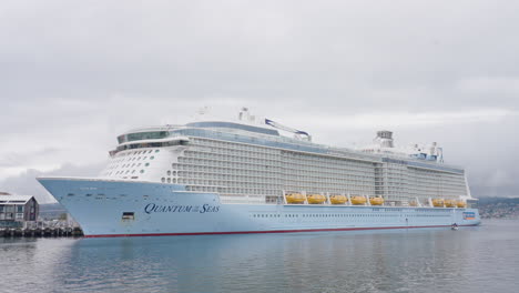 Luxury-Cruise-Ship-Royal-Caribbean-International-Quantum-Of-The-Seas-On-Harbor-In-Port,-4K-Slow-Motion