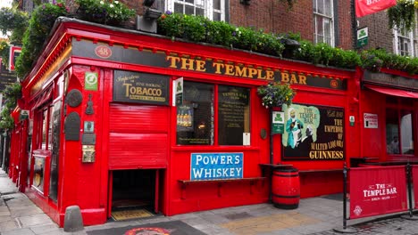 Tilt-down-shot-of-The-Temple-Bar,-iconic-Irish-pub-in-Dublin,-without-crowds