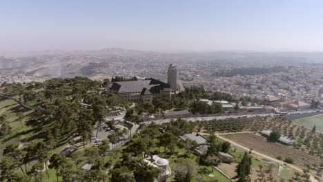 Augusta-Victoria-hospital-building-and-surrounding-nature-in-Jerusalem,-Israel