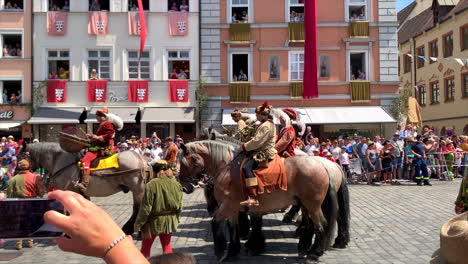 Big-horses-at-the-Parade-at-the-Landshut-wedding,-a-historical-celebration-of-1475-that-is-reenacted-every-4-years,-Landshut,-Germany