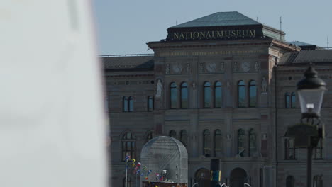 Classic-steamboat-in-front-of-National-Museum-in-Stockholm,-Sweden,-summer-day