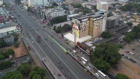 Aerial-View-Car-Moving-Through-Chennai-City-Traffic-Filled-With-Mist