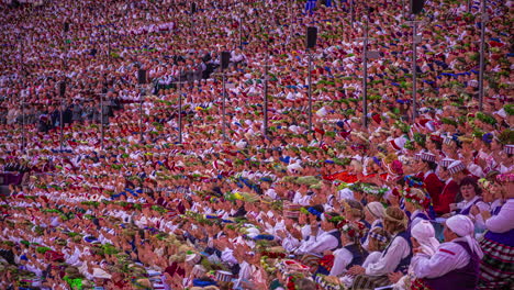 Timelapse-of-people-in-stadium-seating-during-the-latvian-song-and-dance-festival