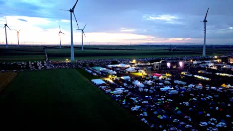 Nova-Rock-Festival-At-Dusk-In-Pannonia-Fields-II,-Nickelsdorf,-Austria---aerial-drone-shot