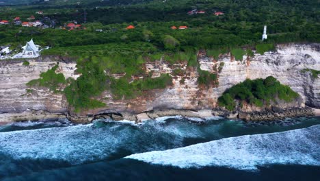 Uluwatu-Cliffs-Beautiful-Landscape-In-Bali,-Indonesia---aerial-drone-shot