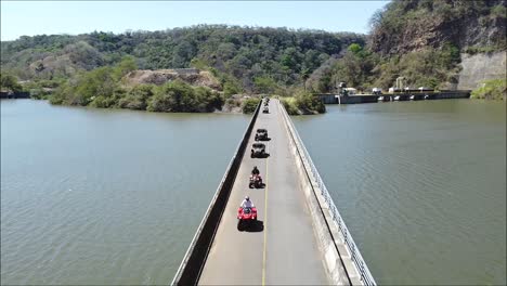 long-bridge-over-lake,-CAN-AM,-SIDE-BY-SIDE-over-bridge,-UTV-Off-Road-Extreme-Racing,-Rally-race,-Polaris,-SIDE-BY-SIDE,-SXS,-ATV