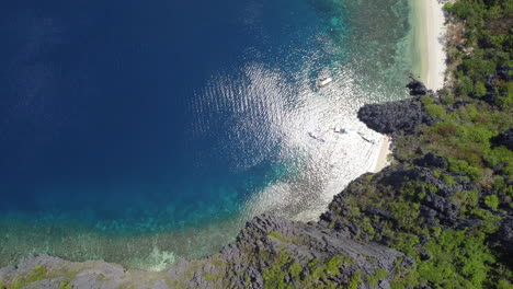 High-angle-aerial-over-the-rugged-cliffs-of-Palawan,-Philippines