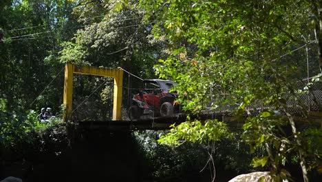 SIDE-BY-SIDE-passing-through-hammock-bridge,-UTV-Off-Road-Extreme-Racing,-Can-AM-Rally-race,-Polaris,-SIDE-BY-SIDE,-ATV,-SXS,-CAN-AM,-all-terrain