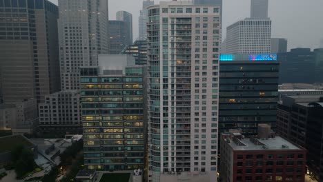 Aerial-rising-shot-of-Chicago-skyline-at-night