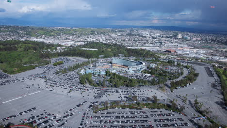 Aerial-Dodger-Stadium-afternoon-game-event-on-an-helicopter-wide-shot-cars-parked