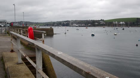Looking-up-Falmouth-Marina-with-Flushing,-in-background