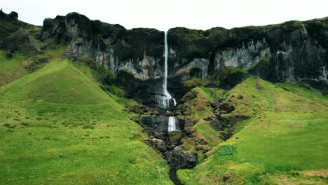 Waterfall-Foss-sidu-off-the-cliff,-Iceland