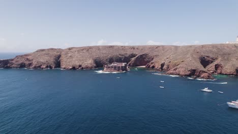 Wide-aerial-orbit-of-tourist-destination-fort-of-the-berlengas