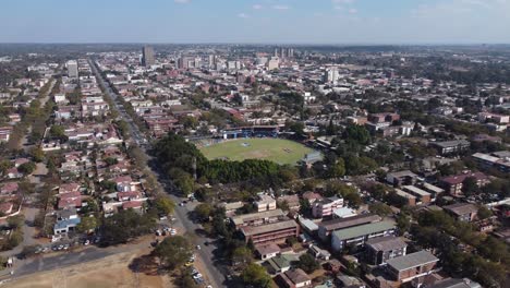 Drone-video-of-a-cricket-match-between-Zimbabwe-and-Sri-Lanka-at-Queens-Sports-Club-in-Bulawayo,-Zimbabwe
