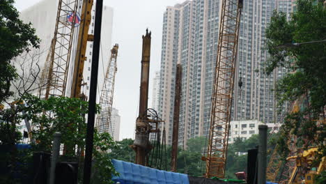 Moving-construction-site-shot-from-below-with-Hong-Kong-skyscrapers-in-the-background