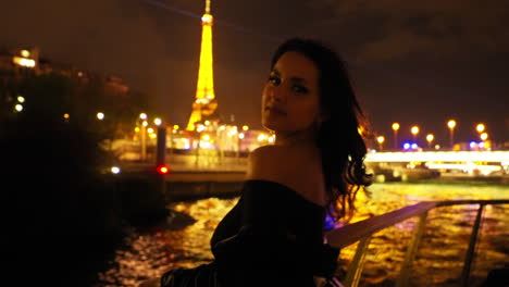 Gorgeous-Traveler-On-A-Boat-Ride-At-Night-On-the-Seine-River-In-Paris,-France