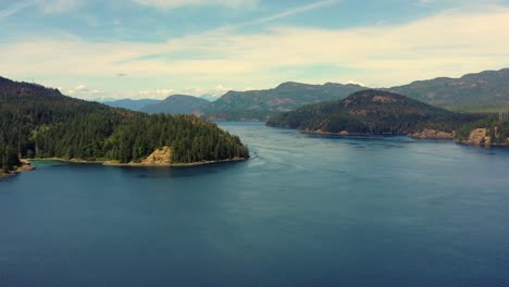 Ripple-Rock-in-Sight:-Drone-Flight-Over-Water-Towards-Islands-and-Mountains-of-Campbell-River