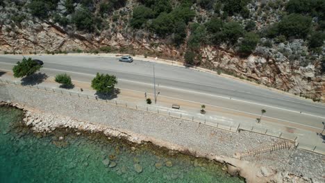 Drone-shot-of-Kaş-ocean-road-and-cars-in-Antalya-region-of-Türkiye