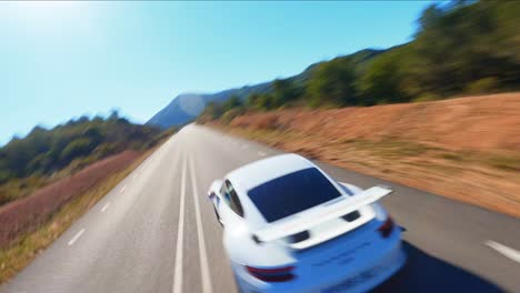 Scenic-FPV-aerial-flying-around-a-white-Porsche-911-along-a-picturesque-mountain-highway