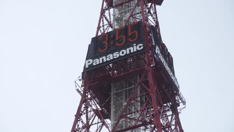Looking-Up-At-Sapporo-TV-Tower-With-Panasonic-Clock-Face