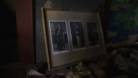 Abandoned-Historic-Framed-Photos-from-Haunted-Mansion-in-Japan