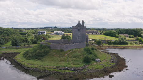 Aerial-Static-Shot-of-Dunguaire-Castle-in-County-Galway,-Ireland
