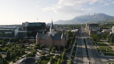 Aerial-tracking-view-of-LDS-Mormon-Temple-in-Provo,-Utah,-summer-morning