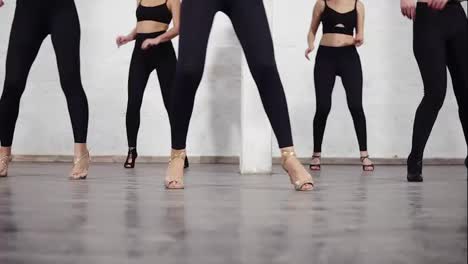 Footage-of-female-legs-in-ballroom-shoes-dancing-basic-bachata-steps.