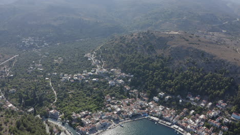 Hilly-sea-coast-aerial:-Lagkada-waterfront-bay-on-Chios-Island,-Greece