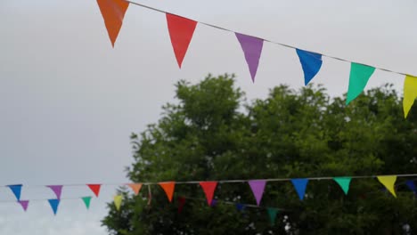 Medium-close-up-of-celebratory-bunting-blowing-in-the-wind