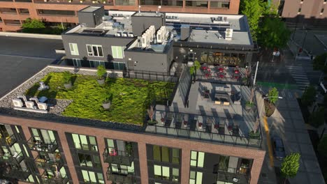 Aerial-view-of-a-rooftop-lounge-above-a-Seattle-condominium