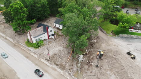 Aftermath-of-Flood-Damage:-Aerial-View-of-Single-Family-Home-with-Excavators,-VT