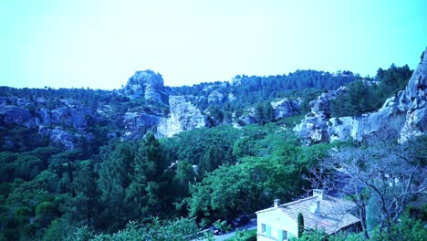 landscape-with-bluish-light-in-france-with-mountains-and-hills-and-small-houses-Les-Baux-de-Provence