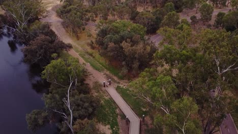 Aerial-View-Over-Cyclepath-And-Boardwalk-Along-Riverside-In-Winter,-Perth-Australia