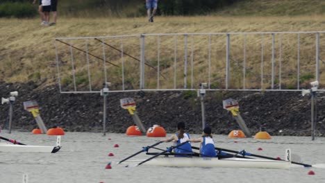 Double-sculls-during-a-race-on-a-water-channel