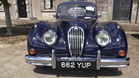 A-Jaguar-XK120-ready-to-pounce-at-a-vintage-car-rally-in-Waterford-Ireland-in-spring-on-a-visit-to-a-stately-home