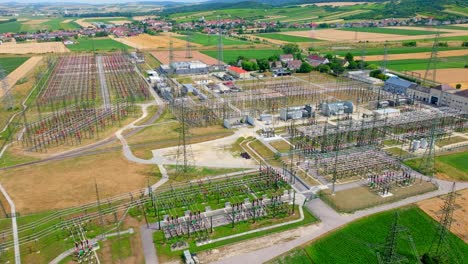 Electrical-Substation-With-Wires,-Transformers-And-Power-Energy-Towers---aerial-shot