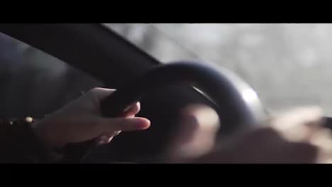 Hands-of-a-man-driving-a-car-in-4k