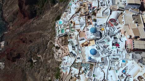 Oia-in-Santorini,-the-greek-island.-Drone-footage