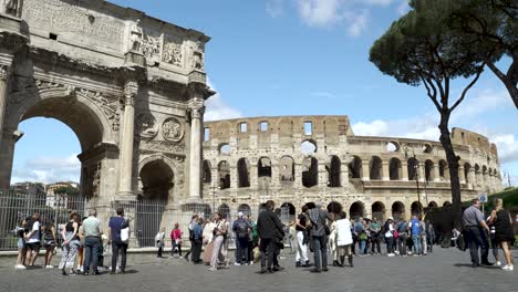 Arch-of-Constantine-And-The-Colosseum-With-Tourists-Viewed-From-Via-di-S