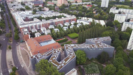 Spectacular-aerial-top-view-flight-Jewish-Museum-city-Berlin-Libeskind-Building,-Germany-Summer-day-2023