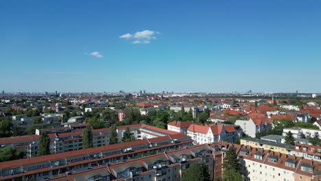 Marvelous-aerial-top-view-flight-Lukas-church-city-Berlin-steglitz,-Germany-Summer-day-2023