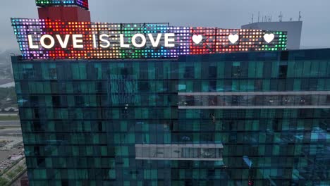 Love-is-Love-sign-on-glass-skyscraper