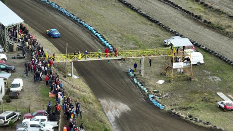 Aerial-View-Of-Spectators-Watching-Motor-Race-At-Racetrack-At-Frutillar,-Los-Lagos-Region,-Chile