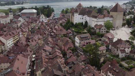 Castle-in-Old-Town,-Annecy---Popular-Touristic-City-in-France,-Aerial
