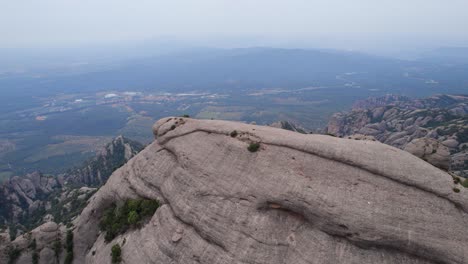 Mountain-top-in-Montserrat-National-Park,-aerial-reveal