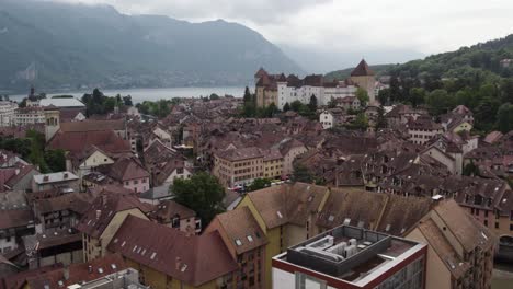City-Landscape-with-Medieval-Castle-in-Annecy,-France---Aerial-View