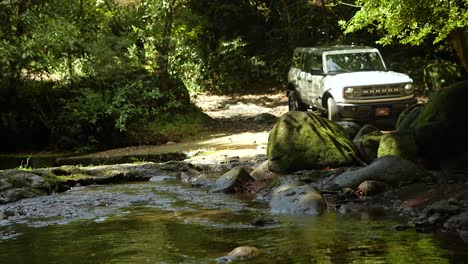ford-bronco-crossing-river-in-the-mountains