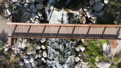Overhead-View-Of-A-Bridge-Over-Rapids-On-Bell-Canyon-Trail-In-Sandy,-Utah,-USA